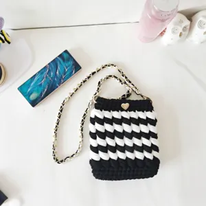 Black and white crochet phone bag, handmade crossbody shoulder bag with gold chain strap.
