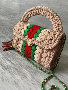 Handmade crochet woven handbag with classic green and red stripes, chic chain strap and tassel.