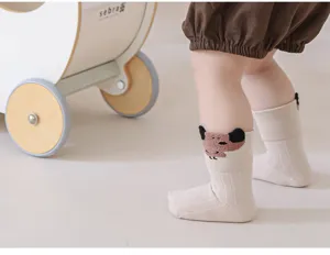 Newborn baby mid-tube socks featuring cute 3D cartoon animal design and soft elastic cotton cuff.