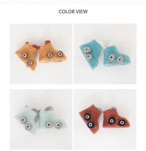 Detailed view of thick baby socks with cute car design and anti-slip sole for toddlers.
