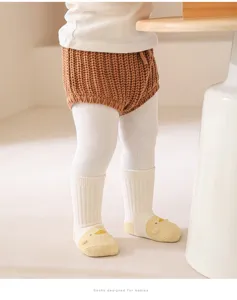 Thickened warm cartoon baby socks with cute chick design, comfortable and soft for infants.