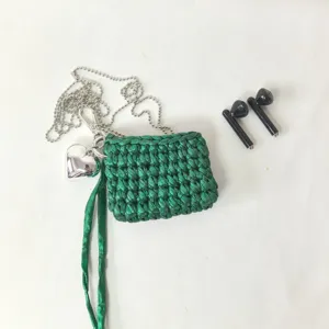 Handmade green crochet earphone bag with silver chain heart pendant chic everyday accessory