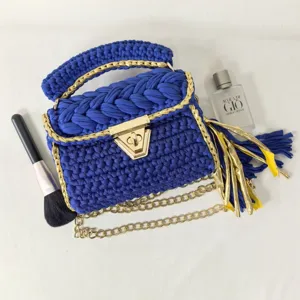 Handmade blue crochet handbag with gold chain, stylish woven fabric shoulder crossbody bag.