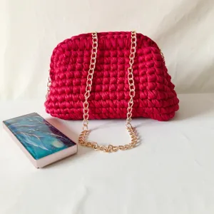 Handmade crochet clutch bag for women, fuchsia woven crossbody bag with gold chain strap.