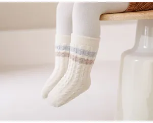 Baby winter cozy fleece mid-tube socks detail shot, soft plush warm infant socks close up