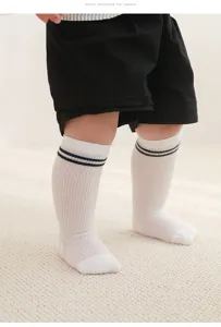 Detailed view of breathable mesh baby long socks with double stripe design for summer wear.