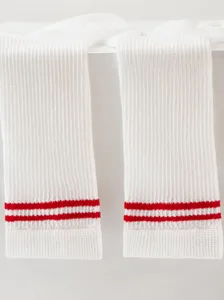 Kids white knee-high socks with red stripes, breathable thin mesh design for summer comfort.