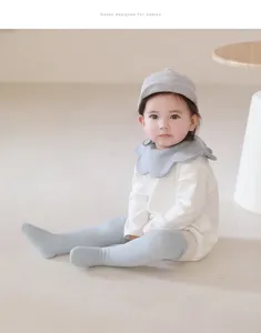 Baby high tube socks detail shot, soft cotton material, comfortable non binding edge for infant daily wear.