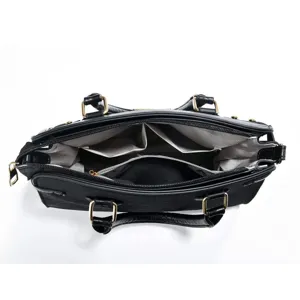 Black leather women handbag interior multi-compartment structure and zipper pocket detail