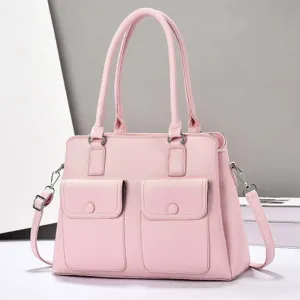Pink leather tote bag with top handles, front pockets and large capacity for women.