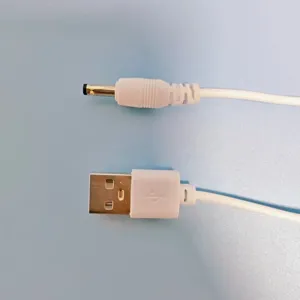 USB to DC power cable detail view, white connector wire for small devices and night lights.