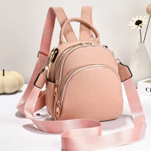 Sac à dos mini en cuir rose pour femme élégant sac de jour décontracté et chic.