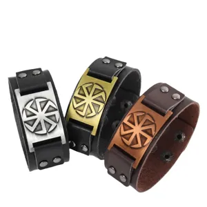 Moderna pulsera de cuero PU punk para hombre con placa de relieve de sol vintage metal.