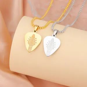 Close-up of stainless steel guitar pick pendant necklaces in gold and silver colors.