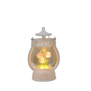 Vintage white LED hurricane lamp night light with glowing roses inside for room desk decor gift.