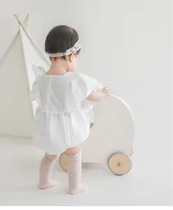 Infant baby girl knee high socks, breathable mesh style with lace ruffle detail, soft cotton.