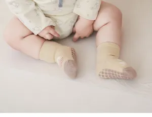 Infant non-slip floor socks for babies, comfortable cotton toddler socks with grips.