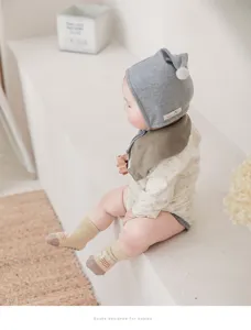 Detailed view of baby anti-slip floor socks in soft beige tone, perfect for indoor walking.
