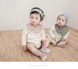 Infant anti-slip floor socks for babies, soft breathable toddler indoor walking socks.