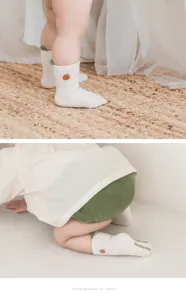 Newborn baby cute cotton mid-tube socks with soft ribbed cuff and lovely embroidery design.