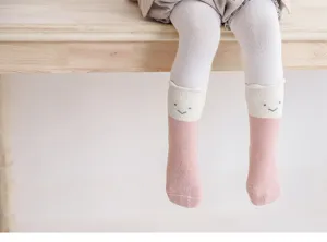 Cute thick warm baby mid-calf socks with lovely embroidered smile face and soft cotton material.