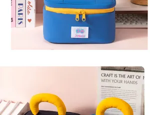 Detail view of the waterproof cosmetic bag featuring a blue body and bright yellow zipper.
