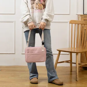 Pink tablet shoulder bag, adjustable strap, soft laptop sleeve for 11 inch iPad devices.