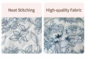 Detailed view of quilted cotton cosmetic makeup bag with blue floral print and neat stitching.