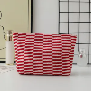 Red and white knitted makeup bag, chic striped checkerboard pattern cosmetic storage pouch.