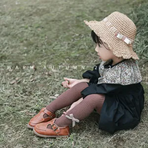 Collants confortables pour enfants en coton peigné avec joli nœud pour le printemps.