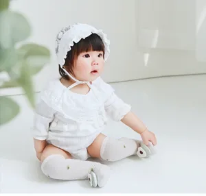 Infant knee-high socks with cute fruit dolls, breathable mesh summer baby socks detail view.