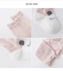 Detailed view of breathable mesh baby cotton over-the-knee socks with cute animal face.