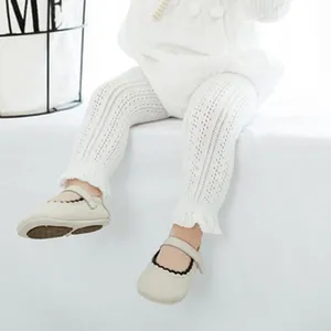 Details of toddler white breathable mesh leggings, soft cotton knitted tights for little girls.