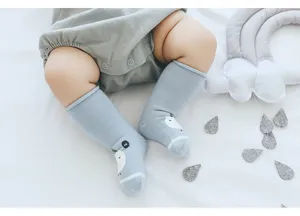 Cute infant long tube socks in light blue with adorable cartoon fruit pattern for baby boys girls.