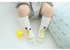 Cute baby long knee-high socks with cartoon radish print, soft cotton for infants 0-3y.