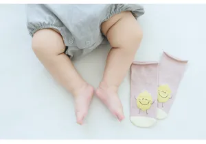Cute baby long socks with cartoon lemon pattern, soft cotton warm hosiery for infants.