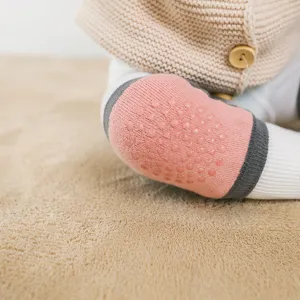 Comfortable baby crawling knee pads with anti-slip grip dots, breathable toddler anti-fall gear.