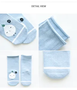 Detailed view of light blue baby socks featuring cute cartoon radish print and roll cuff design.