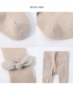 Infant ribbed tights detail view featuring combed cotton material and sparkly bow decor.