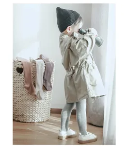 Children ribbed tights detailed view, comfortable combed cotton footed leggings for autumn daily wear.