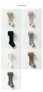 Detailed view of ribbed cotton baby tights in multiple solid colors for autumn wear.