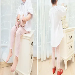 Detailed view of hollow mesh baby leggings showing the soft knit texture and comfortable fit.