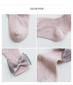 Baby pink ribbed socks feature sheer mesh bow detail, soft double needle loose cuffs for daily wear.