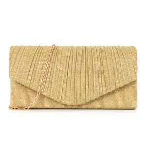 Gold glitter pleated evening clutch bag detail, elegant party purse with metallic chain.
