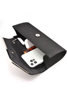 Elegant black glitter evening clutch bag for women, perfect for parties and weddings.