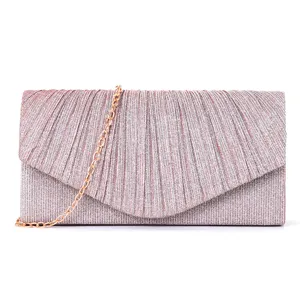 Detailed close-up view of the sparkling glitter evening clutch bag with elegant pleated design.