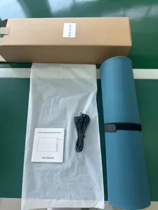Silikon-Wärmematten-Details mit gerollter Matte, Netzkabel, Handbuch und Verpackungskarton.