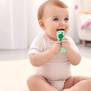 Jouet de dentition en silicone pour bebe, forme de telecommande, apaise les gencives douloureuses.
