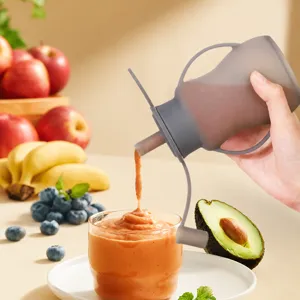 Silicone baby food pouch with X-shaped anti-choking spout, portable squeeze puree container.