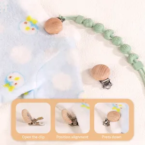 Silicone pacifier chain with wooden clip, safe baby teething toy and anti-loss strap.